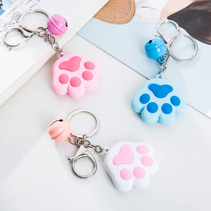 Porte-clés en silicone souple avec patte de chien et chat