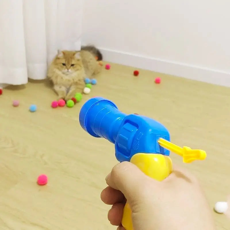 Jouets interactifs pour chats, pistolet à balles.